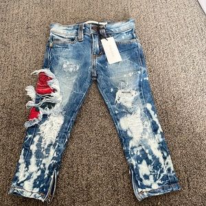 Golden denim blue destructed jeans. 2T